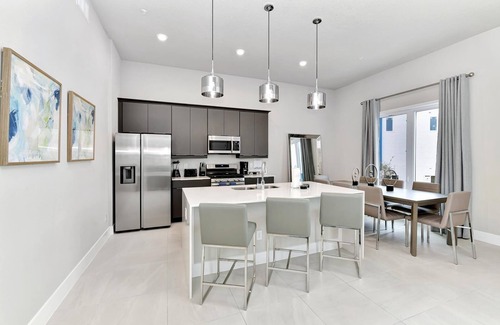 Reunion Hotel | Spacious Modern Condo with Pool Table, Rooftop Terrace and Large Loft. Reunion Resort Water Park Access near Disney at Spectrum Resort Orlando by Rentyl - B9 #238