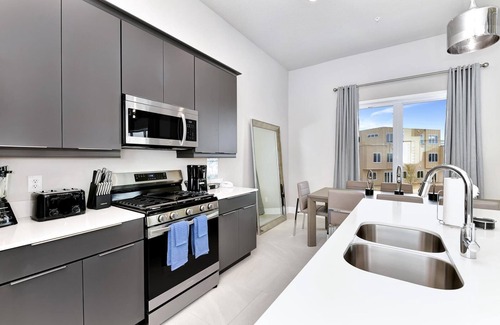 Reunion Hotel | Spacious Modern Condo with Pool Table, Rooftop Terrace and Large Loft. Reunion Resort Water Park Access near Disney at Spectrum Resort Orlando by Rentyl - B9 #238