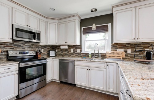 Mooresville House | Spacious Oasis with heated pool/spa, covered patio, office & near Lake Norman
