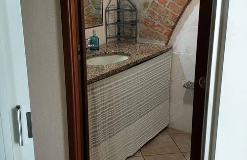 Grosseto Other | Spacious one-bedroom apartment with large bedroom, porch over entrance and pool