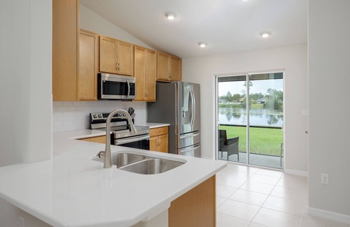 Indian Trails House | Spacious Pet Friendly Home with Lake View, Short Drive to Beach