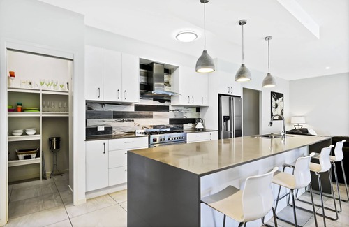 Noosaville House | Spacious Resort Style Home with Solar Heated Pool, Huge Outdoor Patio with TV