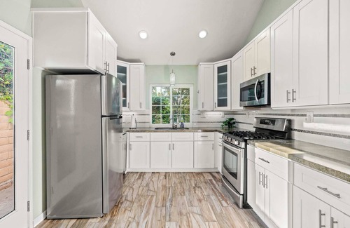 Guasti House | Spacious Retreat w Modern Decor and Private Yard