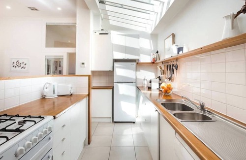 Middle Park Apartment | Spacious, Stylish House with Private Courtyard near Shops, Cafes, Beach and Tram