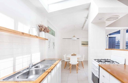 Middle Park Apartment | Spacious, Stylish House with Private Courtyard near Shops, Cafes, Beach and Tram