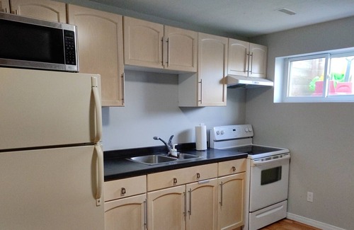 Kitchener House | Spacious separate unit available with free parking.