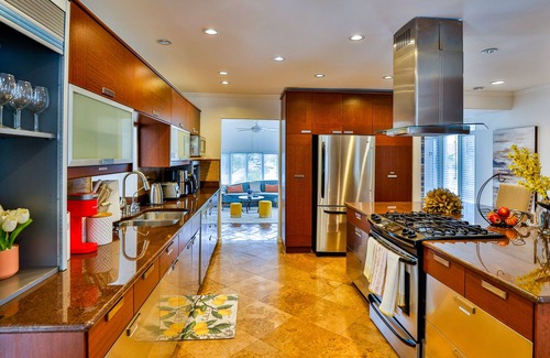 Orange House | Spacious vacation home with fireplace, yard and pool