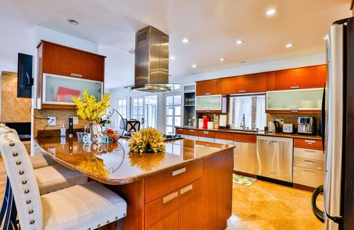 Orange House | Spacious vacation home with fireplace, yard and pool