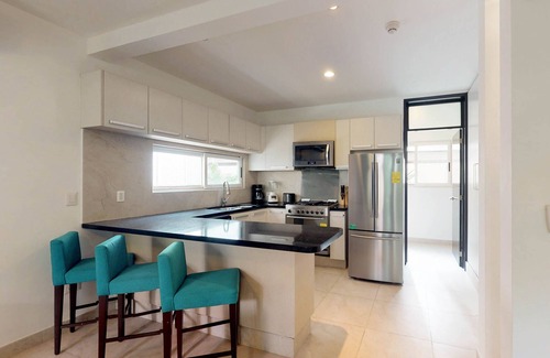 Playa del Carmen Villa | Spacious villa with balcony, patio, strong WiFi, partial AC, pool & gym