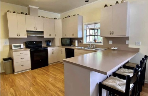 Covington House | Spacious waterfront home on Jackson Lake.