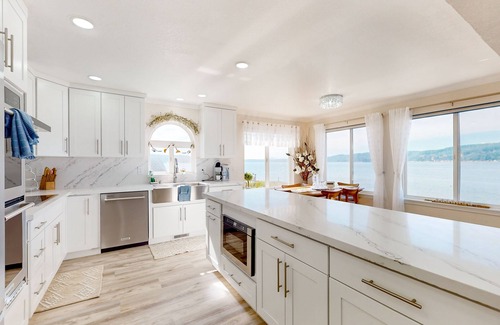 Belfair House | Spacious waterfront home with beach access, kayaks, grill, mtn views, & AC