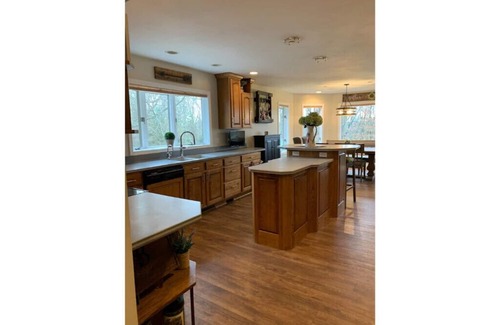 Eureka House | Spacious Waterfront Home With Riverside Bar Area - Enjoy the Fox River Lodge!