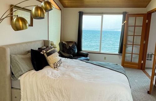 Kingston House | Spacious waterfront retreat with inviting deck, fireplace & games