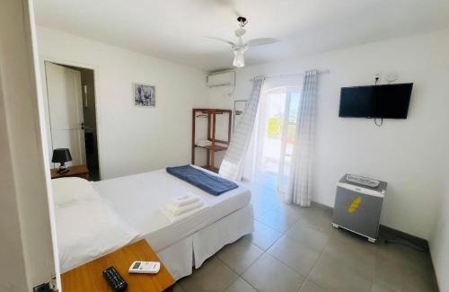 Itauna House | Spazio Itaúna Pousada