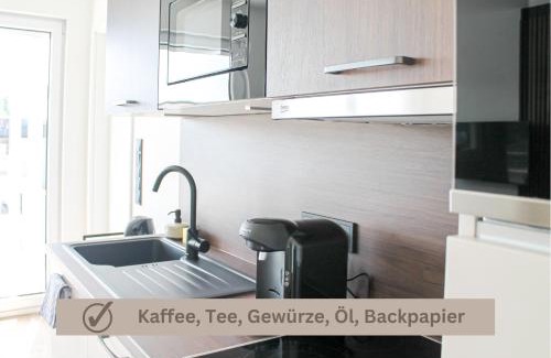 Rauental Apartment | Special Apartment - stadtnah, Balkon, Parkplatz, E-Ladestation, Gitterbox für Fahrräder, Fitnessstudio