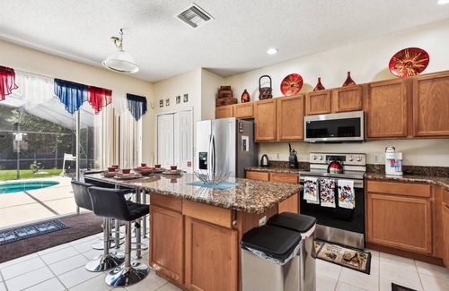 Lake Berkley Villa | SPECTACULAR DISNEY THEME HOME 7 Bed Lake Pool 24HR Spa GameRm 5 King Beds