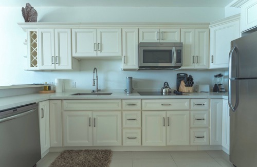 Bodden Town Condo | Spectacular Ocean Front Sea Palm Villa #12