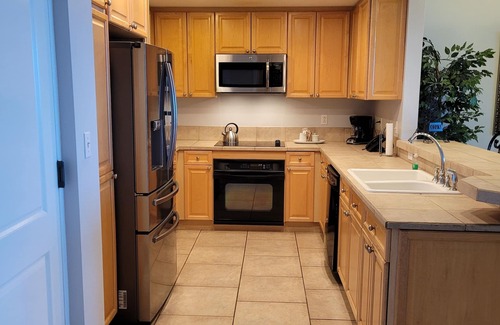 Pensacola Beach Condo | Spectacular views of the Bay! Beautiful Condo Steps from the Beach.