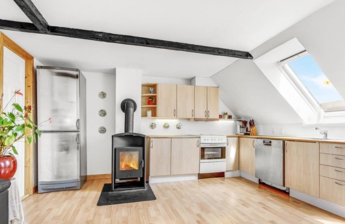 Sydals Apartment | Spend a wonderful vacation in this spacious apartment with sea view.