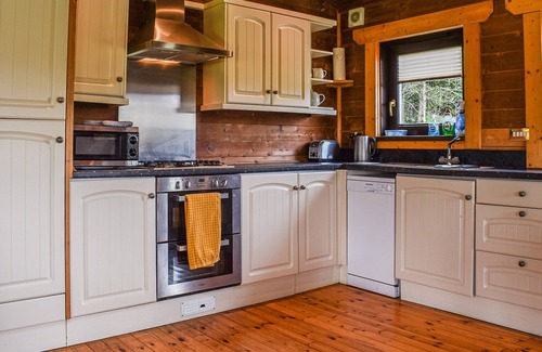 Exebridge Cottage | Spend time with loved ones at Heron Lodge, with picturesque views and wonderful accommodation, you w