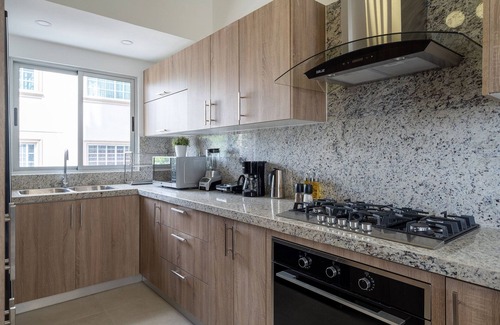 Ensanche Quisqueya Condo | Splendid-KingBed-3BR-Pool-AC-Modern-WiFi-Yellowkey