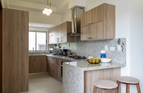 Ensanche Quisqueya Condo | Splendid-KingBed-3BR-Pool-AC-Modern-WiFi-Yellowkey