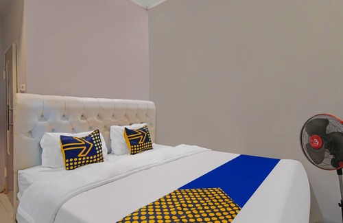Pekanbaru Hotel | SPOT ON 92570 Putri Guest House Syariah Near SPBU Rimbo Panjang