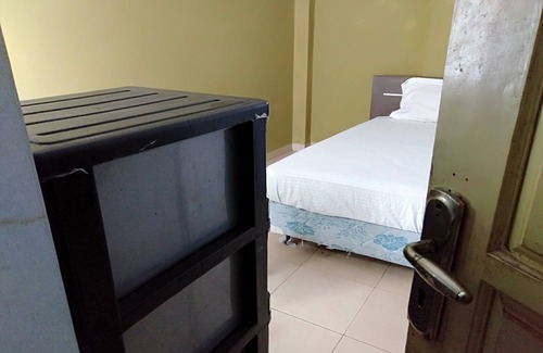Jambi Hotel | SPOT ON 93464 Penginapan Tulimario Syariah