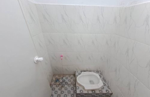 Jambi Hotel | SPOT ON 93464 Penginapan Tulimario Syariah