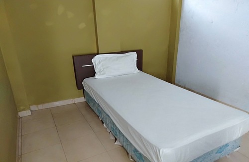 Jambi Hotel | SPOT ON 93464 Penginapan Tulimario Syariah