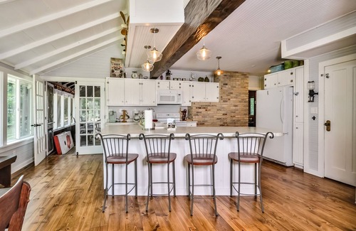 Minocqua House | Sprawling lakefront home with dock access, kayaks, firepit, and wood fireplace