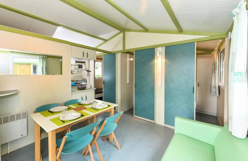Clohars-Carnoet Ski Chalet | Standard Chalet 25m2 (2 Schlafzimmer) + überdachte Terrasse 2 bis 5 Personen - 2 Pers. im Preis enthalten