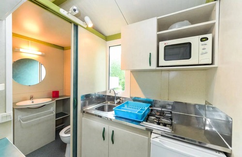 Clohars-Carnoet Ski Chalet | Standard Chalet 25m2 (2 Schlafzimmer) + überdachte Terrasse 2 bis 5 Personen - 2 Pers. im Preis enthalten