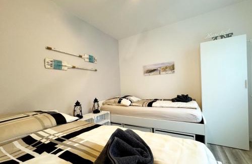 Busumer Deichhausen Apartment | STANMA Heimat am Meer 100 m zum Meer mit Strandkorb