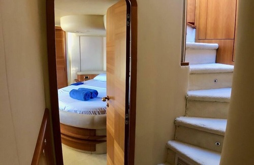 Bodrum City Center Boat Rental | Stay at a luxury crewed 2011 Azimut 55 Fly yacht in Bodrum 3 cabins for 6 guests