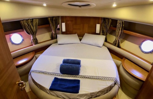 Bodrum City Center Boat Rental | Stay at a luxury crewed 2011 Azimut 55 Fly yacht in Bodrum 3 cabins for 6 guests