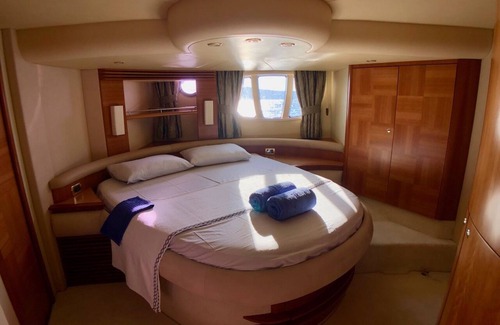 Bodrum City Center Boat Rental | Stay at a luxury crewed 2011 Azimut 55 Fly yacht in Bodrum 3 cabins for 6 guests
