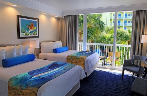 St. Pete Beach Hotel | Stay at RumFish Beach: 4 Balcony Rooms Near Tropicana Field & Aquatic Preserve