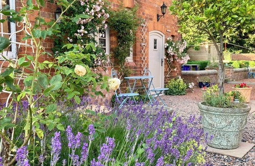 Halfway House Cottage | Stay in a Regency Coachouse retreat set in a rural Shropshire village.