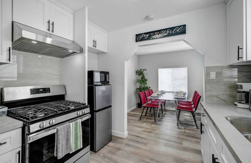 South el Monte House | Stay in Comfort & Style: 3BR Gated Oasis with AC, Full Kitchen, and Relaxing Front Yard Patio.