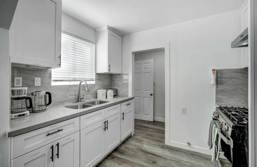 South el Monte House | Stay in Comfort & Style: 3BR Gated Oasis with AC, Full Kitchen, and Relaxing Front Yard Patio.