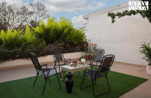 Amritsar Villa | StayVista's Fiddle Leaf Home - Elegant Interiors, Spacious Lawn & Inviting Balcony