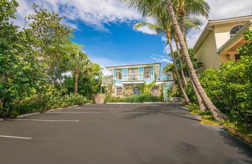 Juno Beach House | Steps to Beach Hidden Gem Boutique Hotel