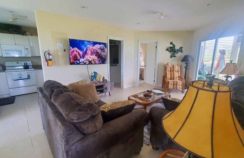 North Side Condo | Steps to Sand & Sea - Oceanfront Condo with Pool in Quiet Cayman Kai/Rum Point