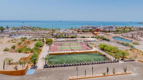 La Paz House | Steps to Tennis and the Beach Shared Pool and Gym