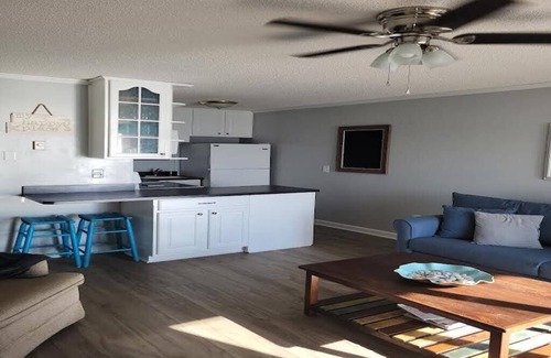 McCutcheon Field Condo | Steps to the Beach! Just “Wait-N-Sea” what this condo has to offer!