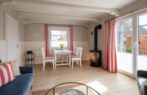 Suederhafen Apartment | Stilvolles Kapteins Cottage mit Kamin - Inge