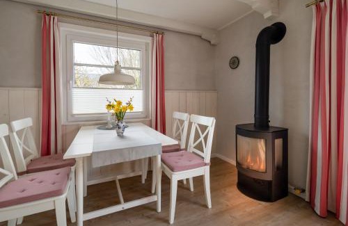 Suederhafen Apartment | Stilvolles Kapteins Cottage mit Kamin - Inge
