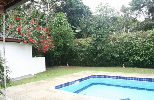Costa do Sol House | Story home in Cond. Costa del Sol - Bertioga, 300 meters from the beach, with outdoor pool