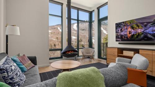 Stowe Area Apartment | Stowe Mt Resort Treehouse Ski in Ski Out Mt Views By Stowe Mountain Rentals